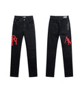 AMIRI STAGGERED LOGO SKINNY JEAN - Black Red